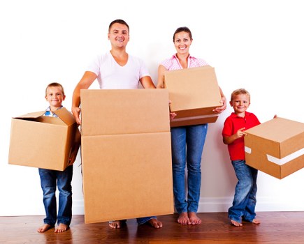 Removal team planning a move in a West Kensington street