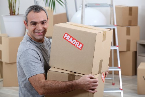 Man and van team handling a flat move in West Kensington