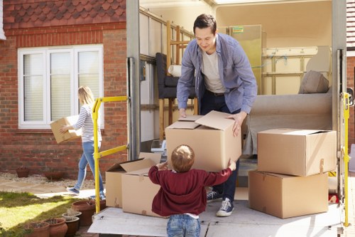 Careful handling of furniture through a West Kensington apartment building