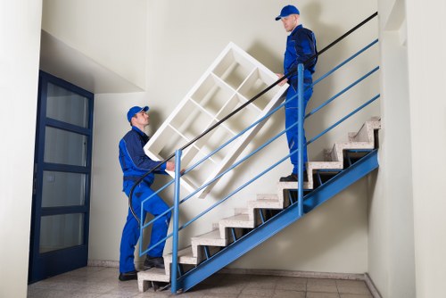 Professional movers handling a workplace relocation in West Kensington