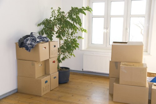 Local team collecting a sofa and dining furniture from a West Kensington property