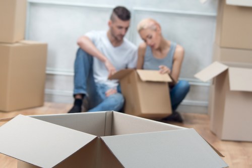 Labelled packing boxes prepared for a local move in West Kensington