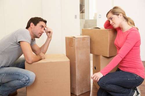 Local office removals team handling desks and furniture near West Kensington