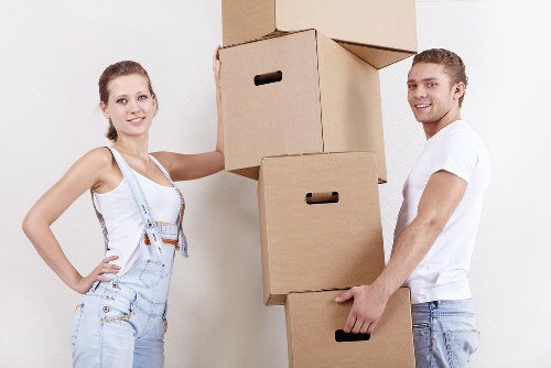 Careful unloading of household items at a property in West Kensington