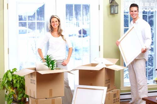 Packing boxes and furniture prepared for a local West Kensington house move